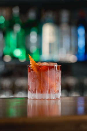 Boulevardie cocktail on a bar desk. Bright backgroundの写真素材