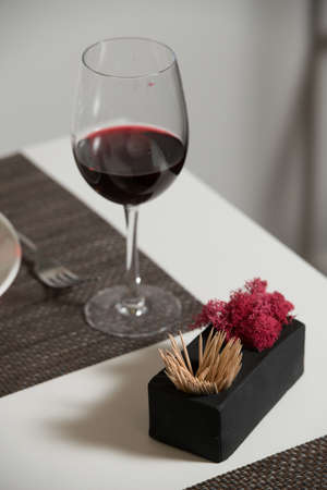 Glassware and cutlery for catered event dinner. Glasses of wineの写真素材