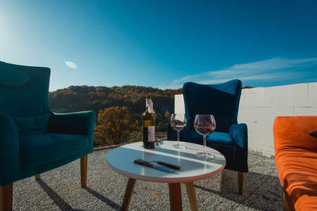 chilling zone on the root of a new unfinished bulding. Celebrating the purchase of a new apartment.の写真素材