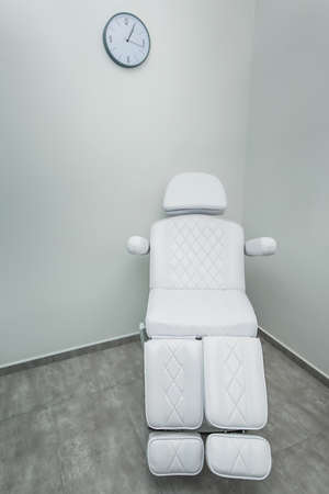 white treatment chair in a clean room.の写真素材