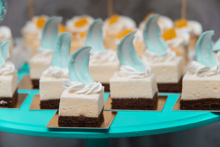 sweets on blue stand. Food knolling concept.の写真素材