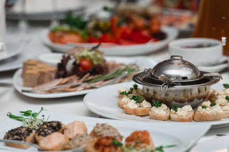 Breads and butter for appetizer. metal plate.の写真素材