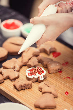 Close up of cookies baking. Little kids hands.