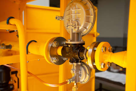 gas equipment. Yellow pipes. gas switching cabinetの写真素材