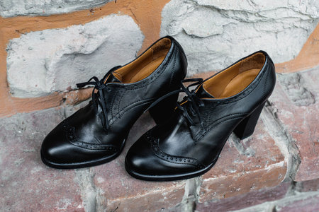 womans old fashioned classic boots on heelsの写真素材