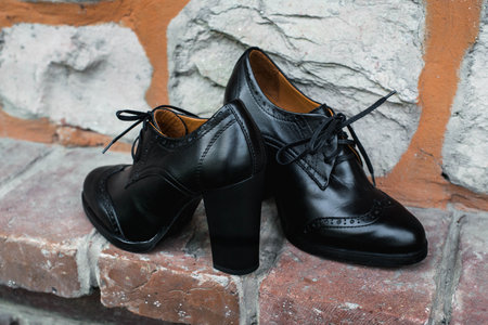 womans old fashioned classic boots on heelsの写真素材