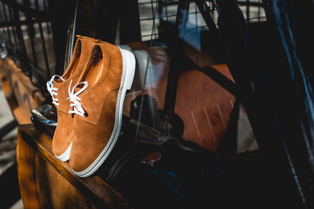 yellow suede shoes with white soles. Street photoの写真素材