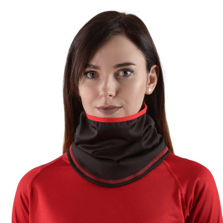 pretty brunette with long hair in a red shirt with a black balaclava with red edgingの写真素材