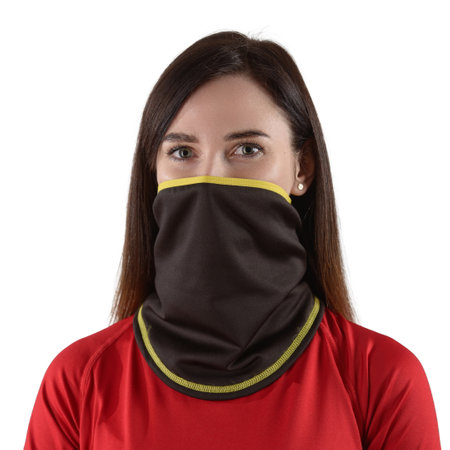 pretty brunette with long hair in a red shirt with a black balaclava with yellow edgingの写真素材