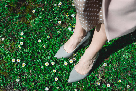high heeled grey shoe. street photo. Fashion style footwear