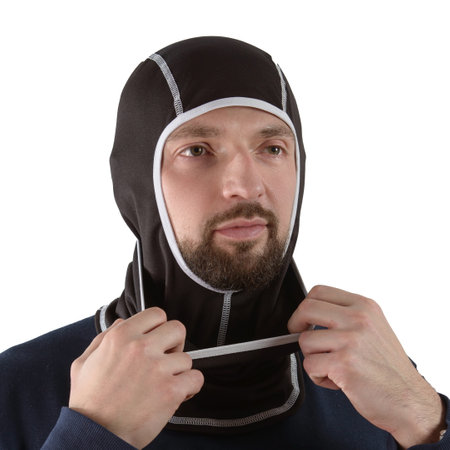 brunette man in a blue shirt with a black balaclava with gray edgingの写真素材