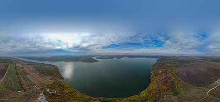 Autumn view on panorama of the Dniester River. landscape with canyon, forest and a river in front....