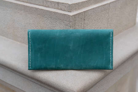 hand made leather wallet . Leather craft. Selective focusの写真素材