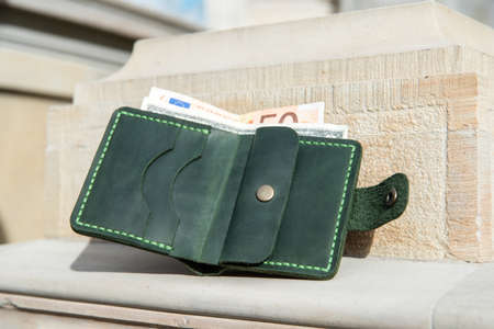 hand made leather wallet . Leather craft. Selective focusの写真素材