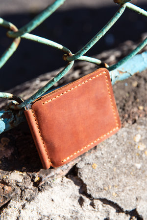 hand made leather money holder. Leather craft. Selective focusの写真素材