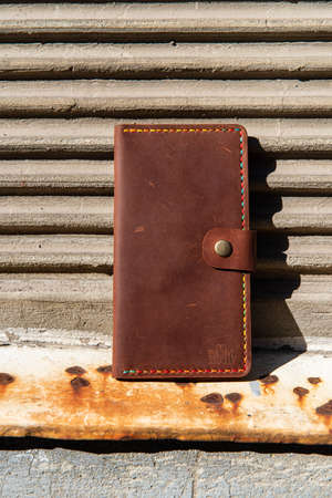 hand made leather wallet . Leather craft. Selective focusの写真素材