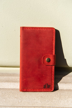 hand made leather wallet . Leather craft. Selective focusの写真素材
