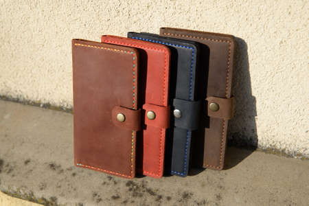 Set of hand made leather man wallet . Multi colored. Leather craft. Selective focusの写真素材