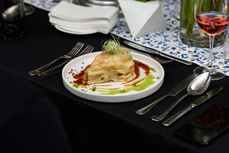 Francesinha, traditional Portuguese sandwich originally from Porto. Served in a restaurantの写真素材