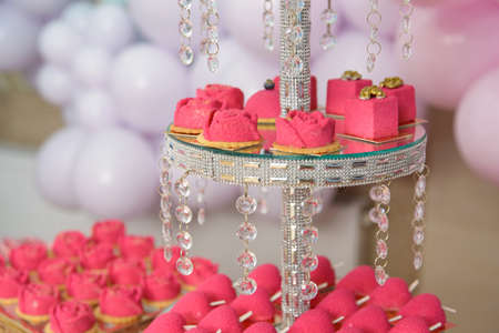 Dessert table for a party. cupcakes, sweetness and fruitsの写真素材