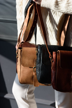 Old vintage leather bags with leather strap. Beautiful small womens leather bagsの写真素材
