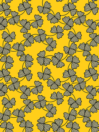 Seamless pattern with clover leaves on a yellow background.の写真素材