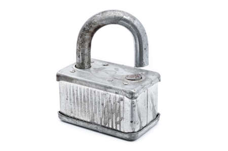 Rusted broken padlock isolated on white backgroundの写真素材