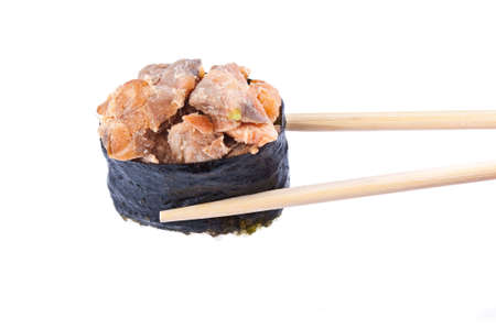 Sushi with chopsticks isolated on a white backgroundの写真素材