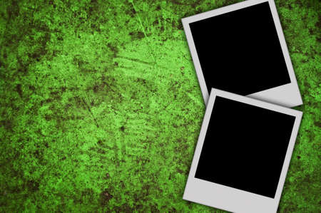 blank photo on grunge green backgroundの写真素材