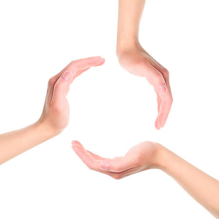 Circle made of hands isolated on white backgroundの写真素材