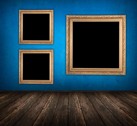 blue empty room with wooden floor and empty frame hanging on the wallの写真素材