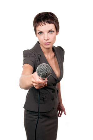 Journalist with microphone isolated on white backgroundの写真素材