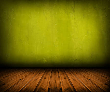 dark vintage green room with wooden floor and artistic shadows addedの写真素材