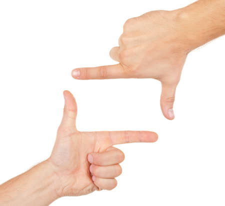 Hands shaped in viewfinder or frame isolated on white backgroundの写真素材