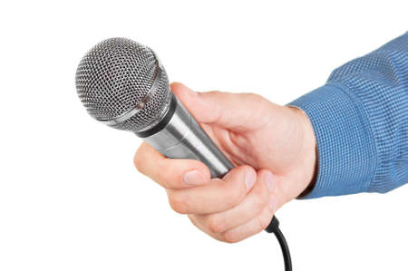 Presenter holding a microphone in hand isolated on white background