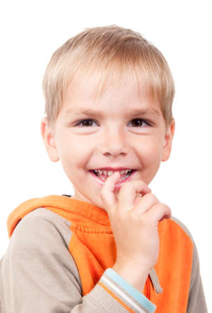portrait of a cute little boy smiling over white