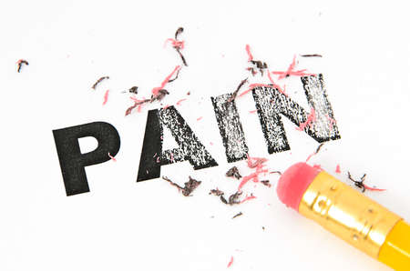 Removing Pain concept with eraser and pencil. 