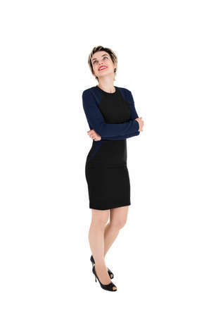 Thoughtful business woman looking up. Isolated over whiteの写真素材