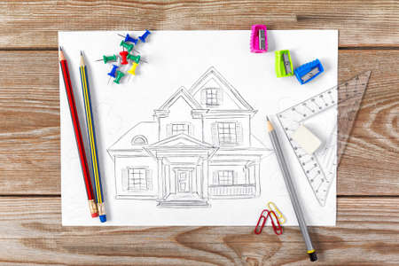 Sketch of housing project on a wooden deskの写真素材