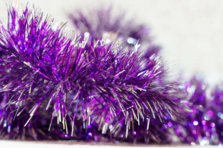 Purple christmas tinsel close upの写真素材