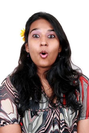 Young asian girl with a suprised look on her face. Isolated on white.の写真素材