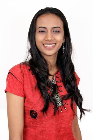Young teenage girl with a  smile. Isolated on a white background.