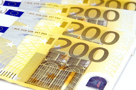 Euro banknotes isolated on a white background.の写真素材