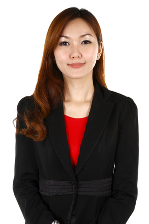 Portrait of a young business woman with a smile, on a white backgroundの写真素材