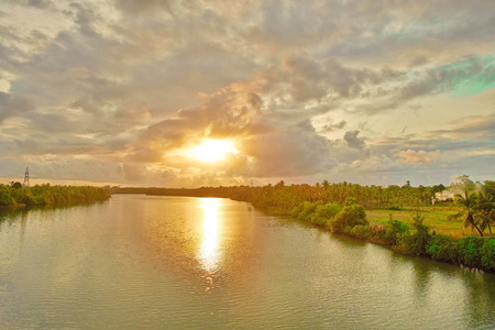 Sunset reflection on the riverの写真素材