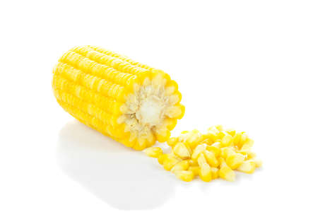 Sweet whole kernel corn and ears of corn on white background