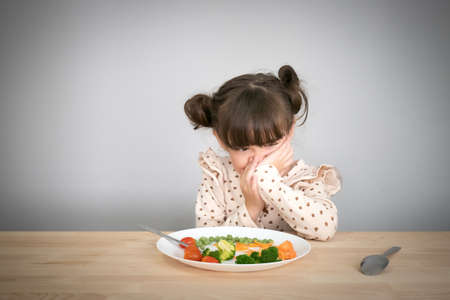 children don't want to eat vegetablesの写真素材