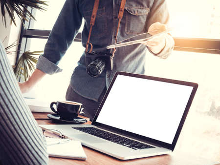 Startup business teamwork concept. Group of young Asian coworkers business people using laptop...