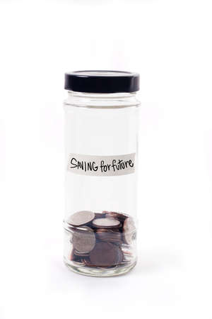 Coins in glass jar on white background for money saving financial concept