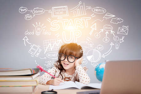 Easy start up business planner management concept : Portrait of a cute girl sitting on office desk...